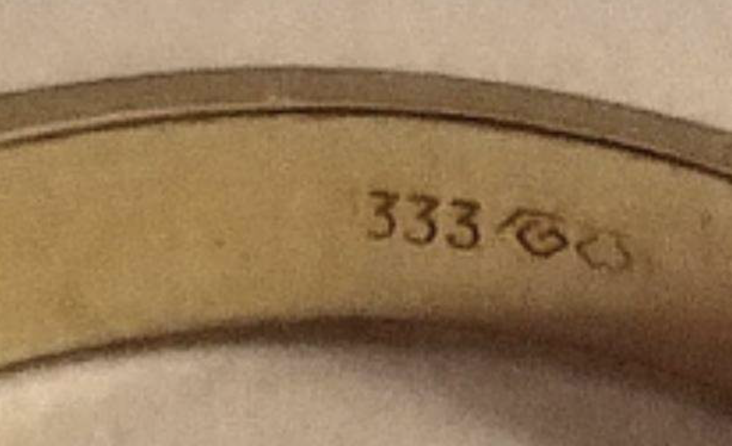 333 stempel indersiden af ring