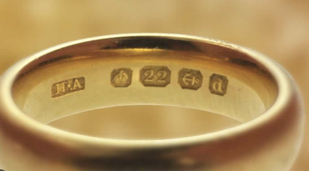22 karat britisk hallmark i ring